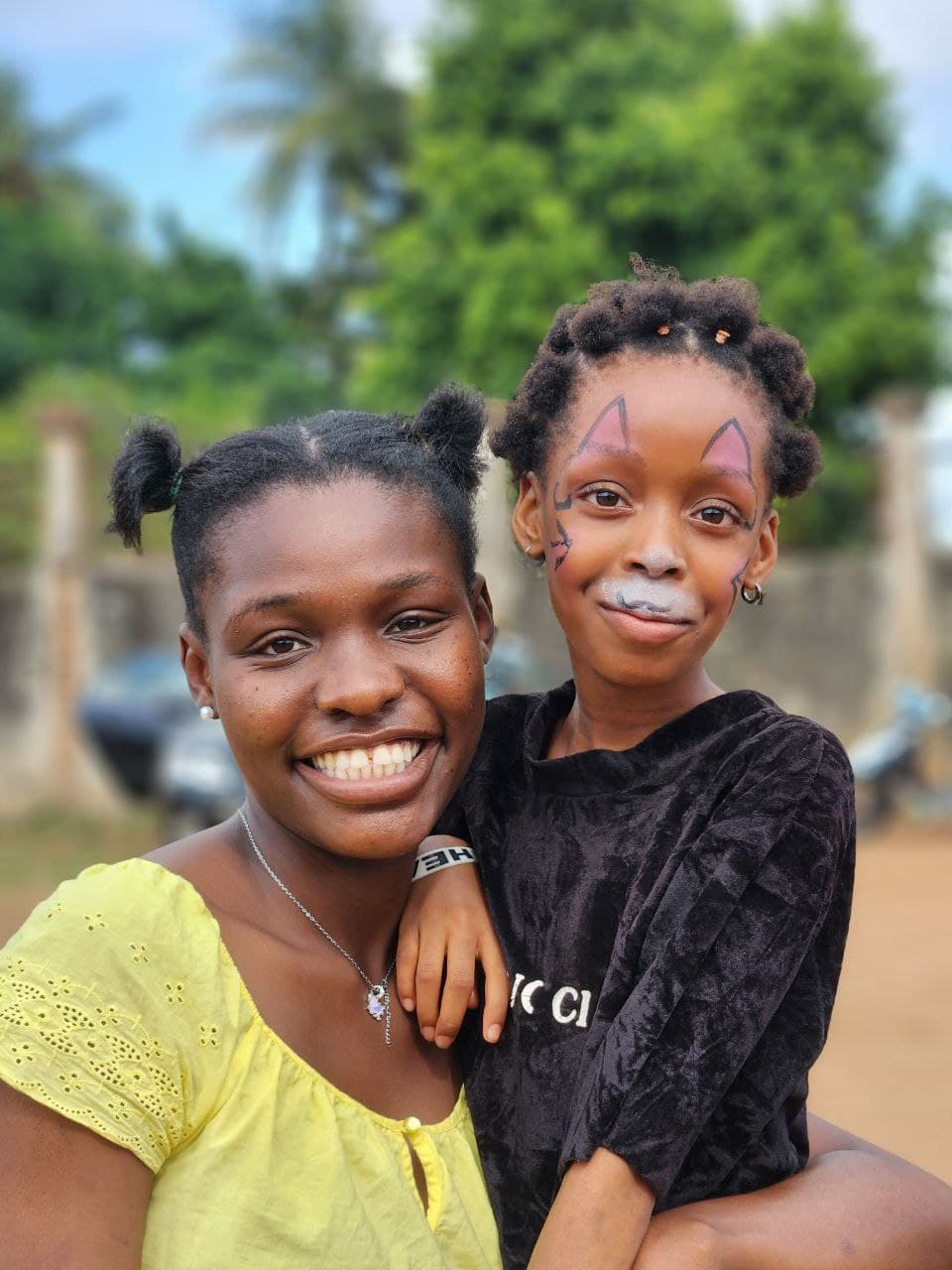 Donate Drive team member with a child